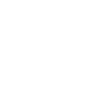 White outline illustration of a barn with a silo and windmill on a light gray background. The barn has a large door and a window above.